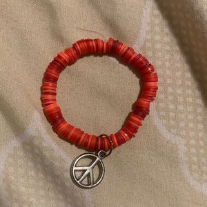 Red bracelet.
